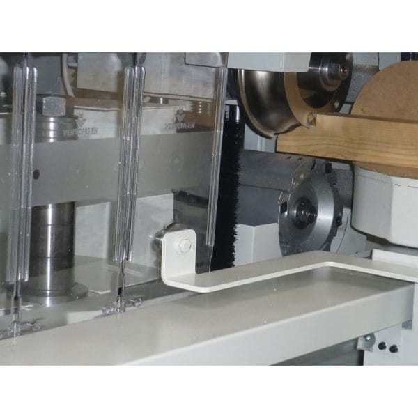 Wooden plank being processed in the Pentho Compact 4 Tenoner